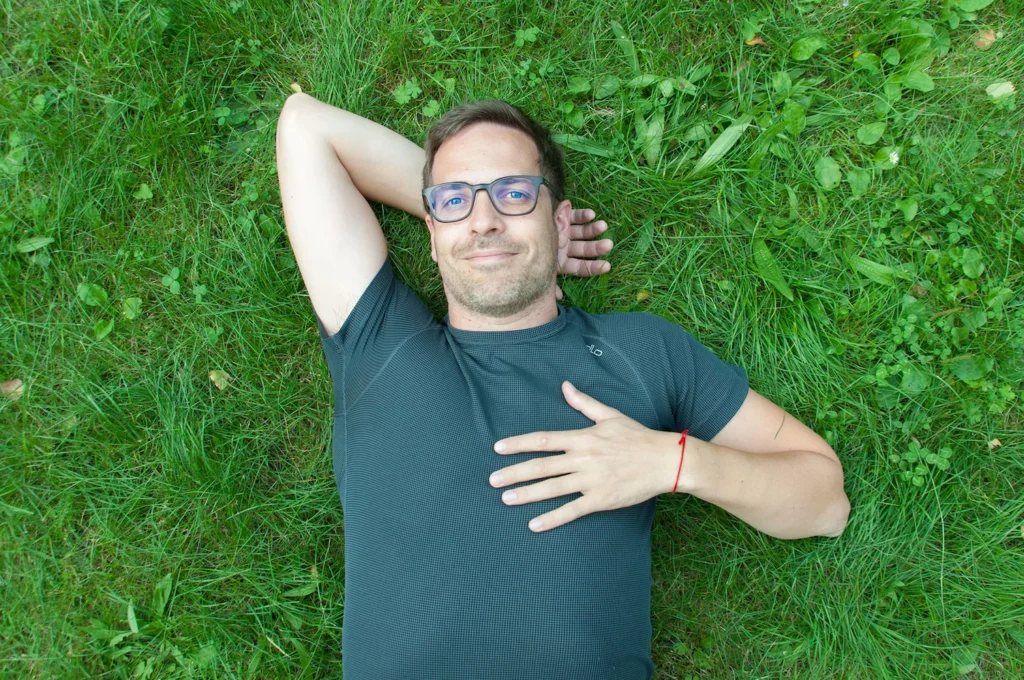 Bastian Hölscher lying on grass